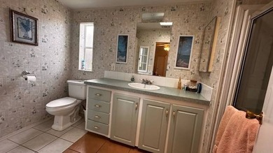 This light and bright Jacobsen home offers a Roof, Hot Water - photo 10