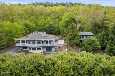 Welcome to an extraordinary lakefront retreat on Schroon Lake in - photo 3