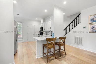 This beautifully updated 2 bedroom, 2 bathroom end-unit townhome