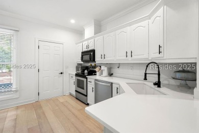 This beautifully updated 2 bedroom, 2 bathroom end-unit townhome