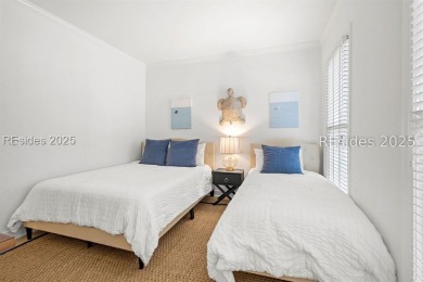 This beautifully updated 2 bedroom, 2 bathroom end-unit townhome