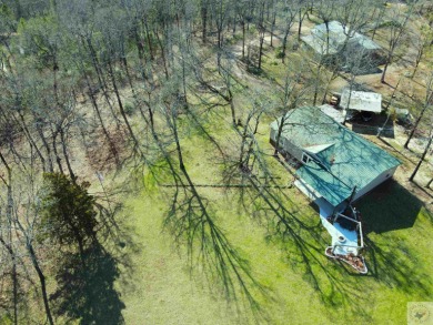 Lake Home For Sale in Hughes Springs, Texas