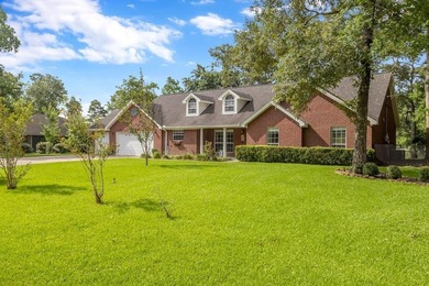 Experience luxury lakeside living in this custom built brick - photo 1
