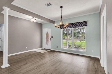 Experience luxury lakeside living in this custom built brick - photo 9