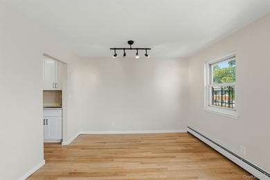 Welcome home to this beautifully renovated top-floor, walkup - photo 11