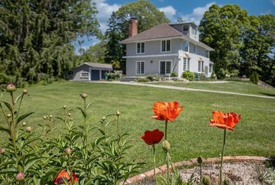 Set behind stone pillars and surrounded by 4.72 acres of - photo 1