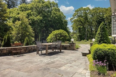 Set behind stone pillars and surrounded by 4.72 acres of - photo 9