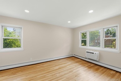 Welcome home to this beautifully renovated top-floor, walkup - photo 25