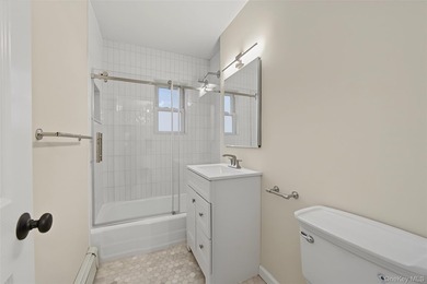 Welcome home to this beautifully renovated top-floor, walkup - photo 26
