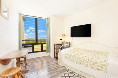 Located at the east end of Waikiki, this cozy corner studio at