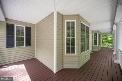 Imagine starting your day on the expansive covered front porch - photo 8