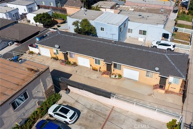 Welcome to this charming TRIPLEX located at 1405 Lagoon Ave in - photo 2