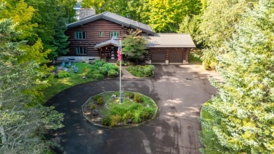 Magnificent Montana Full Log Home! 300 feet of frontage on - Lake Home For Sale in Mercer, Wisconsin