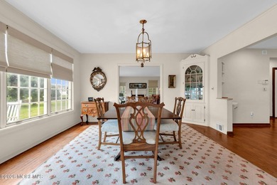 Perfectly positioned just one home from the blue waters of the - photo 22