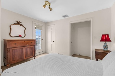 Perfectly positioned just one home from the blue waters of the - photo 50