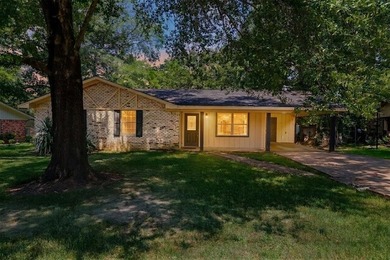 Full of charm, this inviting 3-bedroom, 2-bath home is proof - photo 1