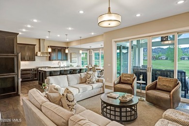 Welcome home to the coveted Eagle Ranch community, where - photo 5