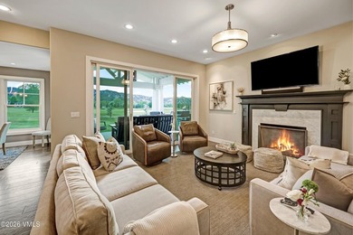 Welcome home to the coveted Eagle Ranch community, where - photo 6