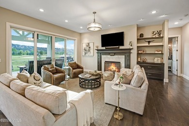 Welcome home to the coveted Eagle Ranch community, where - photo 7