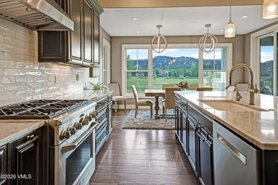 Welcome home to the coveted Eagle Ranch community, where - photo 9