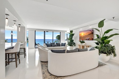 Rare, direct oceanfront views embrace this beautifully updated - photo 1