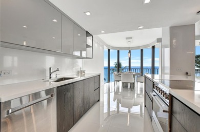Rare, direct oceanfront views embrace this beautifully updated - photo 3