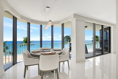 Rare, direct oceanfront views embrace this beautifully updated - photo 4