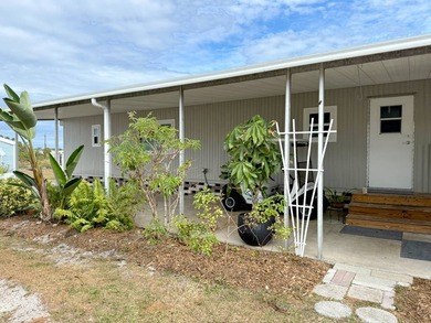 Discover relaxed Florida living at 17 Larkspur Avenue in the - photo 3