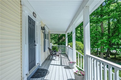 This charming 4-bedroom, 2 1/2-bath Colonial, is where comfort - photo 3