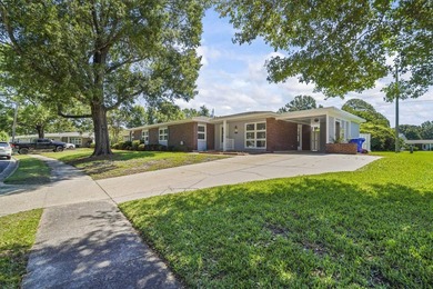 This charming 3-bedroom, 1.5-bath home offers a spacious floor - photo 1