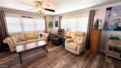This SPACIOUS doublewide -- now available TURNKEY -- is IDEALLY - photo 3