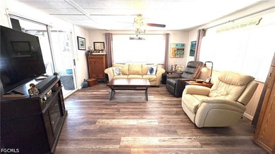 This SPACIOUS doublewide -- now available TURNKEY -- is IDEALLY - photo 9