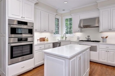 This all-brick colonial sits on a private end lot and offers a - photo 22