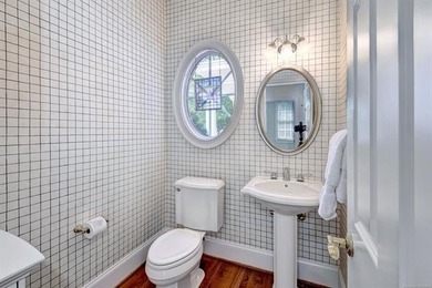 This all-brick colonial sits on a private end lot and offers a - photo 27