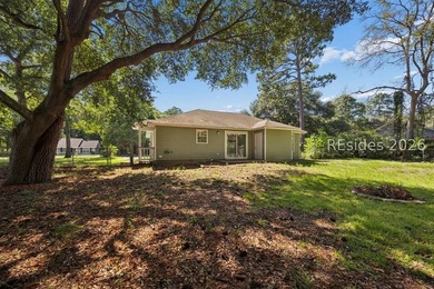 Tucked back on a quiet Lady's Island street, 16 Robin Way is a - photo 28
