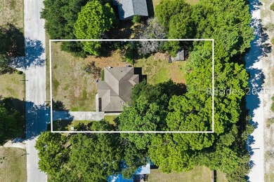 Tucked back on a quiet Lady's Island street, 16 Robin Way is a - photo 31