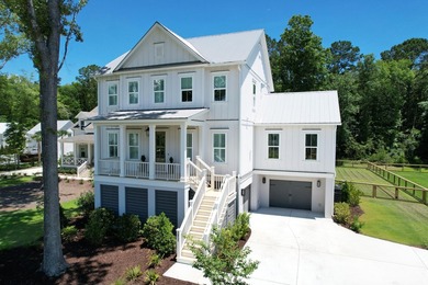 This Southern coastal chic family home is situated on a .4-acre - photo 1