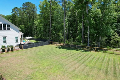 This Southern coastal chic family home is situated on a .4-acre - photo 2
