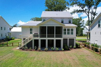 This Southern coastal chic family home is situated on a .4-acre - photo 3