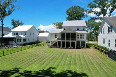 This Southern coastal chic family home is situated on a .4-acre - photo 5