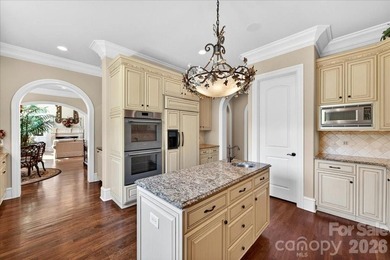 LUXURY LIVING IN PELLYN WOOD! This custom residence built by - photo 11