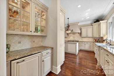 LUXURY LIVING IN PELLYN WOOD! This custom residence built by - photo 12