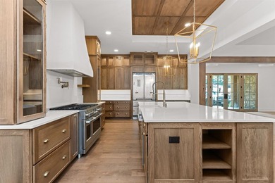 The Hearth is a waterfront home designed around the moments that - photo 14