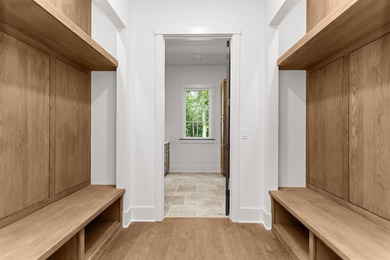 The Hearth is a waterfront home designed around the moments that - photo 17