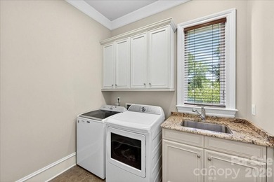 LUXURY LIVING IN PELLYN WOOD! This custom residence built by - photo 22