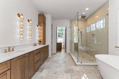 The Hearth is a waterfront home designed around the moments that - photo 24