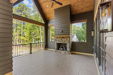 The Hearth is a waterfront home designed around the moments that - photo 28