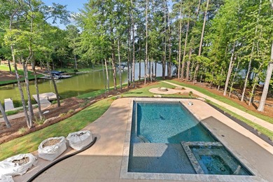 The Hearth is a waterfront home designed around the moments that - photo 29