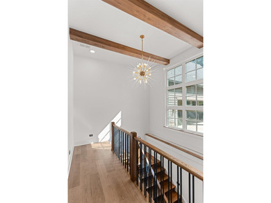 The Hearth is a waterfront home designed around the moments that - photo 30