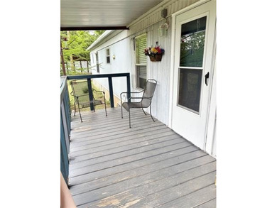 This clean and tidy 2 bed, 2 bath home is located in the highly - photo 3